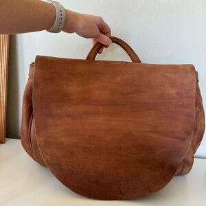 The J. Peterman Company leather bag